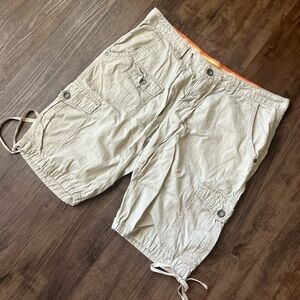 Tan khaki cargo shorts.